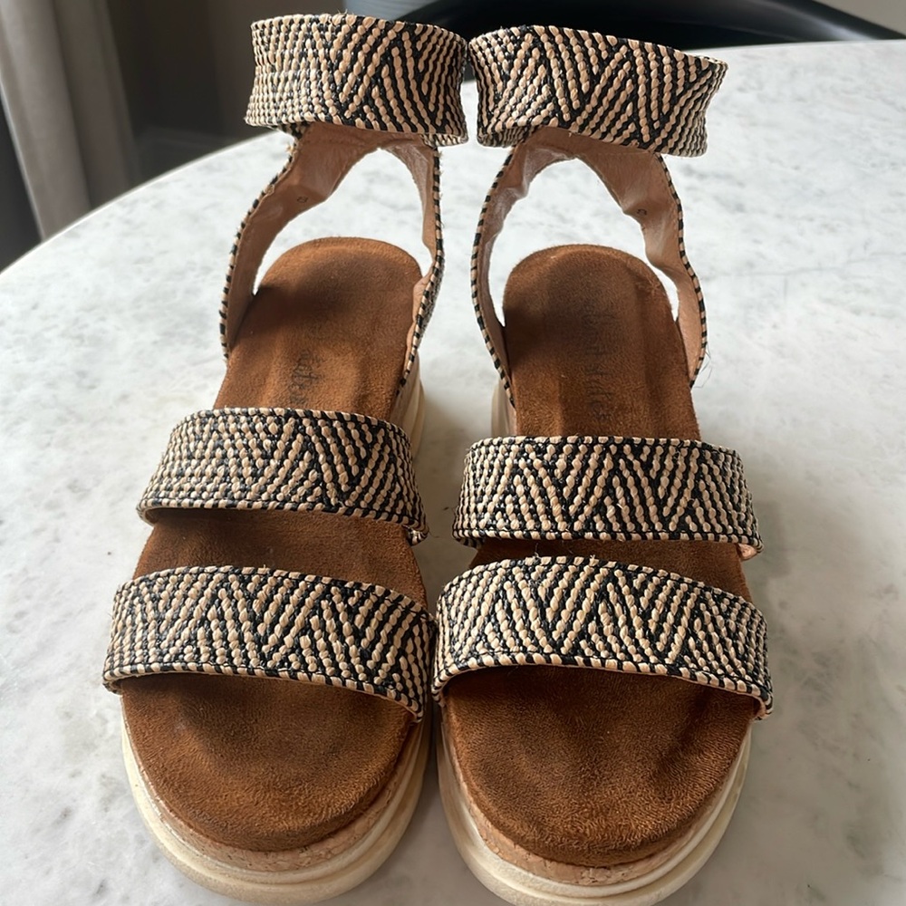 Altered state, black, and tan wedged cork shoes. Woman’s size 8